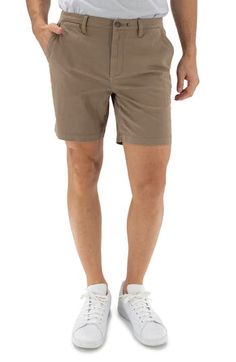 Designed for all-day comfort, these straight-leg chino shorts are made from performance-stretch sateen twill with a key loop in front and a logo patch in back. The pocket liners are made with recycled REPREVE® yarns. 7" inseam; 10 1/2" front rise Zip fly with button closure Front slant pockets; front coin pocket; back welt pockets 98% cotton, 2% spandex Machine wash, tumble dry Imported Solid Cotton 4-way Stretch Shorts, Cotton 4-way Stretch Shorts, 4-way Stretch Cotton Shorts, Casual Shorts With 4-way Stretch And 5-inch Inseam, Casual Cotton Chinos With 4-way Stretch, Casual Cotton Shorts For Business, Casual Cotton Shorts For Business Casual, Business Casual Cotton Shorts, Casual Fitted Shorts With Straight Hem