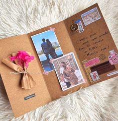 an open book with pictures and flowers on it