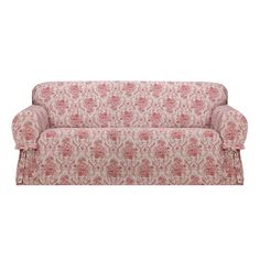 a red and white floral couch with ruffled trim on the arm, sitting against a white background