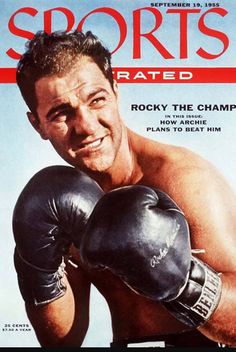 a man wearing boxing gloves on top of a magazine cover