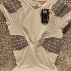 Padded Shirt For Sports Never Worn Still Has Tags Has A Tiny But Of Dirt On It So Can Be Considered Used Nike Fitted Shirt For Sports, Nike Fitted Sports Shirt, Fitted Nike Sports Shirt, Fitted Nike Shirt For Sports, Fitted White Sports Shirt, Nike White Sports Shirt, Shirts Nike, Nike Pro Combat, Nike Pros