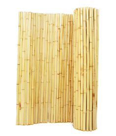 two stacks of bamboo sticks sitting next to each other