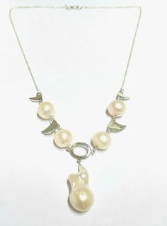 1. Pearl Chain Necklace. 2. 925 silver made 3. Necklace length - 20 inches. 4. Pearl pieces - 5 5. Total weight- 20.580 Grams 6. 100% Handmade. 7. Silver Weight - 4.360 Grams 8. Pearl Weight - 81.1 Carats 9. Closure - S CLASPS This Pearl Necklace is totally handmade from start to finish. We have used 925 silver to make this. This item is irresistible! We hope you add this in your favorites or basket and place an order with us. Thanks. Anirudh Gems Store :- https://www.etsy.com/uk/shop/ANIRUDHGEM Silver Sterling Silver Pearl Necklace With Polished Beads, Silver Pearl Necklace With Polished Beads In Sterling Silver, White Polished Beads Sterling Silver Necklace, White Polished Bead Sterling Silver Necklace, White Sterling Silver Necklace With Polished Beads, Silver Single Strand Custom Necklace As Gift, Sterling Silver Round Beads Necklace For Anniversary, White Sterling Silver Necklaces With Silver Beads, White Sterling Silver Necklace With Silver Beads