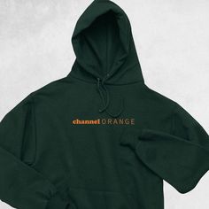 Frank Channel Orange Hoodi A unisex heavy blend hooded sweatshirt is relaxation itself. The material is a thick blend of cotton and polyester. This makes for a plush, soft feel alongside warmth. It's also a great surface for printing. There are no side seams. A spacious kangaroo pocket hangs in front. The hood's drawstring is the same color as the base sweater. .: 50% cotton, 50% polyester .: Medium-heavy fabric (8.0 oz/yd² (271 g/m .: Classic fit .: Tear-away label .: Runs true to size Frank Ocean Channel Orange, Channel Orange, Boys Don't Cry, Orange Hoodie, Aesthetic Hoodie, Cute Hoodie, Frank Ocean, New Energy, Dream Clothes