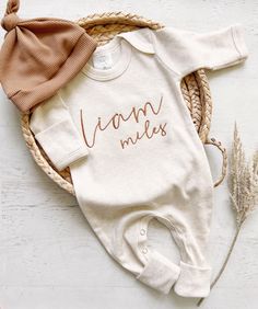 This sweet little boy outfit is perfectly simple. This features a soft oatmeal romper, with a sweet vintage stitched name in burnt fall brown. You can also choose a knotted hat in oatmeal. This outfit makes a perfect coming home outfit, newborn pictures, or baby shower gift.  Name is stitched in lowercase only.  Preemie 5-7lbs (mis-tagged as newborn) Newborn fits approximately 6-9lbs 0/3 fits approximately 9-13lbs Please leave name(s) in the notes to seller box at checkout. If you have any conce Baby Boy Coming Home Outfit, Boy Coming Home Outfit, Hospital Outfit, Personalized Baby Boy, Going Home Outfit, Hat Custom, Organic Baby Clothes, Fall Baby