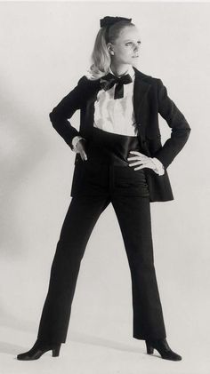 For Sale on 1stDibs - First created in 1966 by famous couturier Yves Saint Laurent, the 'Le Smoking' tuxedo suit for women was the first of its kind to earn attention in the Style Androgyne, White Suspenders, Mia Farrow, Tuxedo Women, Elsa Schiaparelli, Catherine Deneuve, Black Tuxedo, Tuxedo Suit