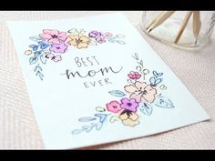 a mother's day card with flowers and the words best mom ever on it