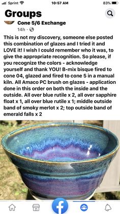 a blue and purple bowl sitting on top of a table