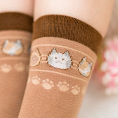 "Happy little cats!"DETAILS:Size? One size, they're quite stretchy! Model in photos is size EU 38 / UK 5 / USA 7. Socks will appear a little bigger when they arrive and will shrink a bit after the first wash - this is normal! Material and care? 60% cotton, 37% polyamide, 3% elastane. Machine or hand wash at 30°C/86°F, air drying recommended! Why are these socks considered B-grade? Manufacturing/design issues, unfortunately! Some of the cat faces at the top aren't very visible when they stretch. (You can see this in the photos!) Other than that, they're perfectly fine, especially if the most important part for you is the kitty at the front, which looks great! :3cNOTES:- please be aware that colors may slightly differ on different screens.Follow Moonlume on Instagram and/or Twitter for the l Cute Cat Design Socks For Winter, Cute Cat Design Winter Socks, Cute Winter Socks With Cat Design, Cat Faces, Cat Face, Sticker Book, Socks For Sale, Crew Socks, Sticker Sheets