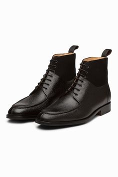 Grain black boots crafted in leather base with split toe. - Aza Fashions Black Goodyear Welted Lace-up Boots For Business, Business Leather Chukka Boots With Rubber Heel Cap, Leather Chukka Boots With Rubber Heel Cap For Business, Black Cap Toe Chelsea Boots With Goodyear Welt, Black High-top Chukka Boots With Leather Sole, Fitted Leather Work Boots For Business, Black Boots With Rubber Heel Cap And Cap Toe, Black Leather Cap Toe Lace-up Boots, Black Leather High-top Chukka Boots