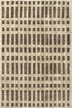 a brown and white rug with squares on it