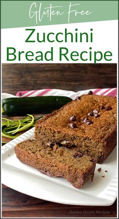 zucchini bread on a white plate with green beans and sliced zucchini in the background