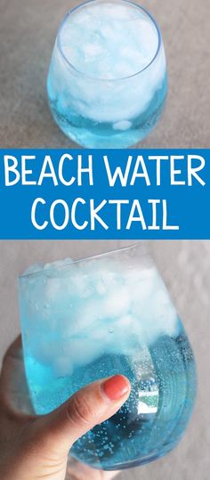 a hand holding a glass filled with blue liquid and the words beach water cocktail on it