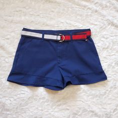 *Tommy Hilfiger Girl Shorts *Belt Included *Ruffled Edge *Adjustable Waist *Size: 10 (Girls) *Color(S): Blue *Excellent Condition *New Without Tags *Smoke-Free Home *Pet-Free Home Blue Bottoms With Built-in Shorts And Adjustable Waist, Tommy Hilfiger Blue Shorts, Tommy Hilfiger Blue Short-length Bottoms, Tommy Hilfiger Blue Short Length Bottoms, Preppy Fitted Blue Shorts, Fitted Preppy Blue Shorts, Blue Fitted Preppy Shorts, Blue Shorts For School In Summer, Preppy Summer Shorts For School