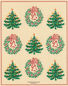 christmas wreaths with bows and bells on them are arranged in the shape of trees