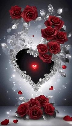 red roses are arranged in the shape of a heart and surrounded by silver filigrees