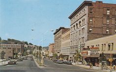 an old photo of a city street in the early 20th century