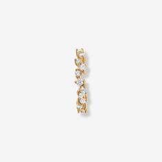 We're crushing on this twinkling hoop. Herbie's unique crystal cluster, in a climbing claw setting, is the perfect finish for any effortless look. Designed to be worn as a single conch piercing or as set of cool lobe earrings when purchased as a pair. Created for you in solid 14 karat gold, you'll want to wear this fine earring always, even when working out or in the shower. Diamond Huggie Ear Cuff, Single Diamond Huggie Ear Cuff, Diamond Huggie Single Ear Cuff, Diamond Huggie Ear Cuff Single Earring, Small Hoop Diamond Jewelry With Sparkling Stones, Diamond Small Hoop Single Cartilage Earring, Small Hoop Sparkling Stones Fine Jewelry, Cubic Zirconia Small Hoop Single Diamond Earring, Single Small Hoop Cubic Zirconia Earring