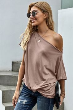 Off-The-Shoulder Slash Neck Loose Fitting Tops $23 S, M , L, XL, 2X Black or Apricot The fabric is very stretchy, which makes it light and ideal for summer weather. This short sleeve blouse is chic delightful and loose enough but not baggy. The side twist knot adds the final touch to this trendy look! Flattering on all body shapes! Pairs well with leggings and jeans. Fabric95%Polyester+5%Spandex Blouse Sale, One Shoulder Top, Loose Fitting Tops, Scoop Neck Top, Jeans Size Chart, One Shoulder Tops, Casual Top, Popular Style, Short Sleeve Blouse