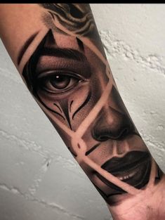 a man's arm with tattoos on it and an image of a woman's face