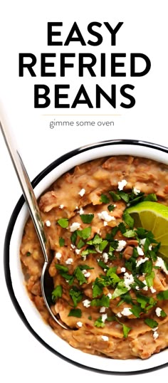 a white bowl filled with beans and garnished with cilantro