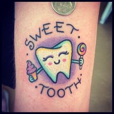 a toothbrush with the words sweet tooth on it