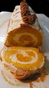 a piece of bread on a plate with a swirly pastry in the shape of an oatmeal