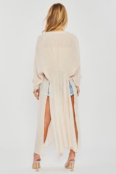 Wrap yourself in luxury with our sheer Maxi Kimono! Featuring elegant side slits, this versatile coverup is perfect for any occasion. Whether lounging by the pool or attending a summer soiree, our kimono adds effortless style and grace to any outfit. Elevate your wardrobe with our Maxi Kimono today! 65% POLYESTER, 35% RAYON Exchanges We have a 7-day exchange policy, which means you have 7 days after receiving your item to request an exchange. We only do exchanges or instore credit. We do not off Beige Kimono, Kimono Swim Cover Up, Maxi Kimono, Swim Coverup, Duster Jacket, Summer Soiree, Weekend Wardrobe, Style And Grace, Night Looks