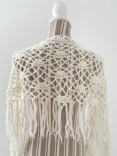 "This is a pretty bohemian off white silver lame narrow shawl wrap for women. This small lace shawl is made of soft acrylic wool yarn in delicate off white color with a tiny bit os shimmering silver lame. This boho shawlette will add delicate femininity to your outfit.  Era: 90s Condition: beautiful vintage pre-owned condition with minor signs of wear - the fringed have become more ruffled with the time Measurements:  63\" /160 cm * 9.8\" /25 cm  without the fringes Fringe length: 6\" / 15 cm Co White Bohemian Shawl With Fringe, Bohemian White Shawl With Fringe, White Bohemian Shawl With Tassels, Bohemian White Shawl With Tassels, Vintage Cover, Shoulder Wrap, Small Boho, Lace Shawl, Shawl Wrap