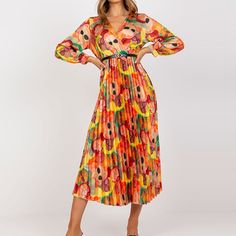 Bloom in elegance with this vibrant floral midi dress! Its playful pleats and flattering V-neck design exude sophistication, perfect for those summer soirees. Feel fabulous and free in this joyful ensemble that's as stylish as it is comfortable. Vibrant Print V-neck Midi Dress For Party, Vibrant V-neck Maxi Dress For Spring, Spring Floral V-neck Dress With Vibrant Print, Summer Pleated Midi-length Dresses, V-neck Midi Dress With Vibrant Print For Party, Summer Brunch Dress With Pleated Hem, Summer Pleated Dress For Brunch, Summer V-neck Midi Dress With Vibrant Print, Spring Party Midi Dress With Vibrant Print