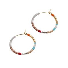 Playful + colorful beaded hoops. Available in 2 endlessly wearable sizes. From spring to fall color vibes. Small hoop 1" in diameter, Large hoop 2". Glass beads, gold-plate Made by artisans in Guatemala Multicolor Small Hoop Earrings For Everyday, Everyday Multicolor Small Hoop Earrings, Everyday Multicolor Jewelry, Bohemian Small Hoop Earrings For Spring, Adjustable Hoop Earrings With Colorful Beads, Everyday Colorful Beads Hoop Earrings, Everyday Colorful Bead Hoop Earrings, Everyday Multicolor Nickel-free Hoop Earrings, Multicolor Small Hoop Jewelry For Spring