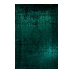 a dark green rug on a white background