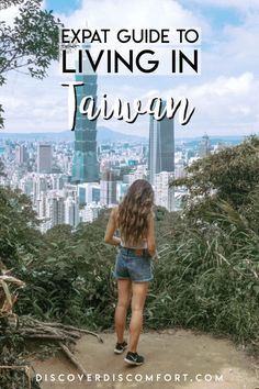 a woman standing on top of a hill looking at the city skyline with text overlay that reads, expat guide to living in taiwan