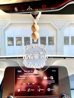 the dashboard of a car with an award on it