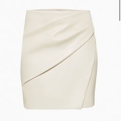 Angie Skirt In Color Birch From Aritzia! New With Tags. This High-Rise Skirt Is Made Of Aritzia’s Vegan Leather (So Soft!!!) Features Gathered Side Detail And Angled Hem Line. Elegant Pleated Pencil Mini Skirt, Elegant Pleated Asymmetrical Mini Skirt, Elegant Fitted Mini Draped Skirt, Elegant Fitted Draped Mini Skirt, Formal Fitted White Mini Skirt, White Asymmetrical Skirt For Formal Occasions, White Pleated Mini Skirt For Night Out, Chic White Mini Pencil Skirt, Formal White Asymmetrical Skirt