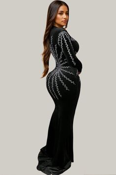 Experience the elegance and luxury of the Ashlyn Sparkly Long Sleeve Maxi Dress. With contrasting mesh and sequin details, a deep V-neckline, and a slim fit, this dress is perfect for those looking to make a statement. The long, semi-sheer sleeves and mermaid-shaped hem add a touch of sophistication, while the high waist and slight stretch velvet fabric provide a comfortable and flattering fit. Elevate your style and make a statement with this stunning dress. 88% Polyester, 12% Elastane Model is Black Tie Gala, Maxi Dress Sale, Sleeve Maxi Dress, Stretch Velvet, Long Sleeve Maxi, Sheer Sleeves, Stunning Dresses, Long Sleeve Maxi Dress, Velvet Fabric