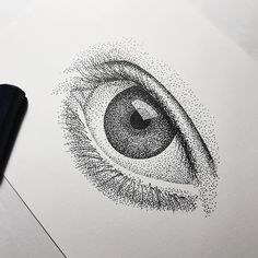 a drawing of an eye with dots on it