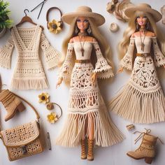 two dolls wearing straw hats and dresses next to handbags, purses and other items