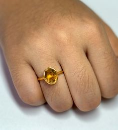 This elegant citrine engagement ring showcases a stunning oval cut in a sleek bezel setting, crafted from 925 sterling silver. Perfect as a November birthstone ring or a promise ring, it makes a meaningful gift for that special someone. Details : Gemstone Name - Citrine Gemstone Shape - Oval Metal : Sterling Silver  Our USP- ✔ Team of Best and Specialized Artisans ✔ Natural and Quality Gemstones ✔ No Nickle and No Cadmium ✔ Wholesaler and Exporter ✔ Production capacity of 10,000+ pcs per month Delivery Time- ✔ Production time differs depending on the product style as every item is handmade with love. Feel free to contact us for any queries or customization. Citrine Promise Ring, Citrine Engagement Ring, Citrine Ring Engagement, November Birthstone Ring, November Birthstone, Ring Oval, Citrine Gemstone, Birthstone Ring, Promise Ring