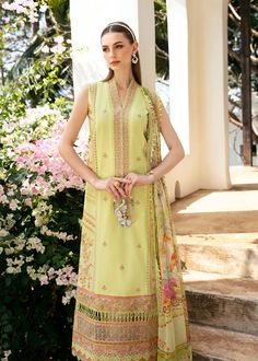 Brand: Kanwal MalikCollection: Mayal by Kanwal Malik Unstitched Luxury Lawn CollectionFabric: Lawn DESCRIPTION: There lies an ethereal charm in this pistachio-hued lawn ensemble, where every stitch tells a story of grace and sophistication. The canvas, awash in a soothing pistachio palette, becomes a captivating tableau adorned with intricate embroidery in delicate shades of pink and peach. But the true pièce de résistance lies in the thoughtful details: diagonally embroidered side panels, adding a dynamic flair to the ensemble, and a flowy printed dupatta that carries with it the essence of floral splendor. each border, meticulously crafted with precision, serves as a testament to the artisan's skill, adding an extra layer of allure to this already enchanting creation. This ensemble is no Kanwal Malik, Pakistani Clothes Online, Pakistani Suits Online, Pakistani Designer Clothes, Unstitched Dress Material, Printed Dupatta, Chiffon Collection, Embroidered Sleeves, Basic Wear