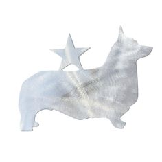 a metal dog and star decoration on a white background