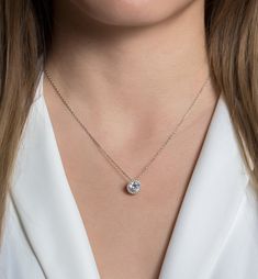 The perfect to give to your Bridesmaid or Bridal party! Give your bridesmaid a gift that she can wear everyday. .925 Sterling Silver Cubic Zirconia pave crystals Hypoallergenic, lead, and nickel free Pendant Diameter: 0.4in (1cm) Chain Length: 16in (40cm) + Extension: 2in (5.1cm) Lobster clasp closure #N430 Elegant Crystal Pendant Solitaire Necklace, Crystal Solitaire Round Pendant Necklace, Dainty Crystal Diamond Necklace For Formal Occasions, Elegant Round Cut Crystal Solitaire Necklace, Elegant Brilliant Cut Solitaire Crystal Necklace, Dazzling Necklace With Halo Setting, Elegant Crystal Solitaire Necklace With Brilliant Cut, Elegant Solitaire Necklace With Brilliant Cut Crystal, Elegant Crystal Solitaire Necklace For Gift