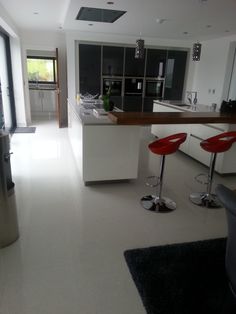 the kitchen is clean and ready to be used as a dining room or living room