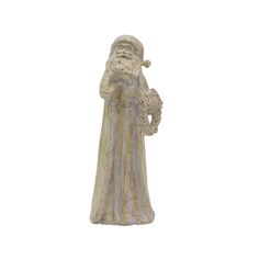 a small statue of santa claus holding a bird in his hand on a white background