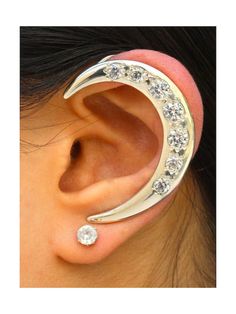 These solid sterling silver Crescent Ear Wraps are set with 7 CZ's each (Cubic Zirconia). Initially Prince wore pairs of my Crescent Moon Face Ear Wraps but Paisley Park requested that I create a simplified version of my design. I removed the moon face and the star and configured it so that seven graduated CZs could be set along the curvature of the crescent. This is the ear wrap that Prince wore from 2002 until his death on April 21, 2016.Our ear wraps require no piercings. The ear wraps have a Celebrity Style Jewelry, Unique Ear Cuffs, Dragon Ear Cuffs, Industrial Earrings, Diamond Shape Earrings, Piercings Unique, Silver Gold Jewelry, Hammered Hoop Earrings, Wrap Earrings