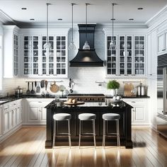 a large kitchen with white cabinets and black counter tops, along with stools that match the hardwood flooring