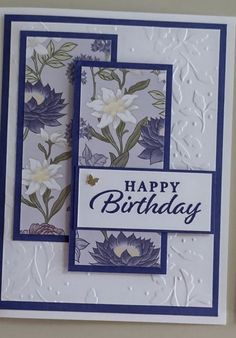 a birthday card with flowers on it