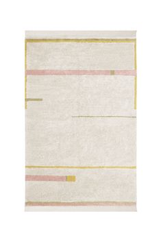 a white rug with yellow and pink stripes