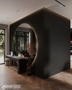 a living room filled with furniture and a large window covered in wood slatting