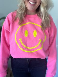 Want to stand out? This is it :-)  Smiley face is heat transfer vinyl and it smooth to the touch - no rough edges or scratchy feeling! * Use code STLPICKUP at checkout to pick up item in Creve Coeur, St. Louis, MO * Playful Pink Sweatshirt With Letter Print, Cute Pink Sweatshirt With Text Print, Trendy Neon Crew Neck Top, Cute Pink Smiley Face Top, Pink Relaxed Fit Fun Sweatshirt, Fun Pink Tops With Smiley Face, Cute Pink Sweatshirt With Slogan, Pink Slogan Sweatshirt For Spring, Trendy Pink Smiley Face Tops